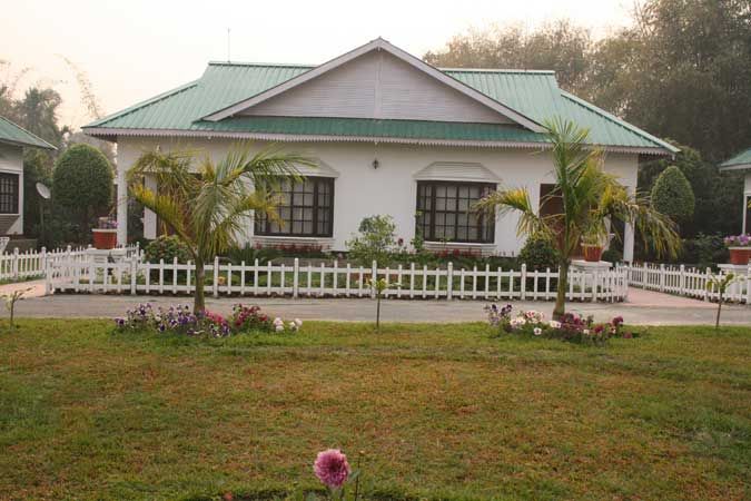 Garden-facing cottage with white picket fencing
